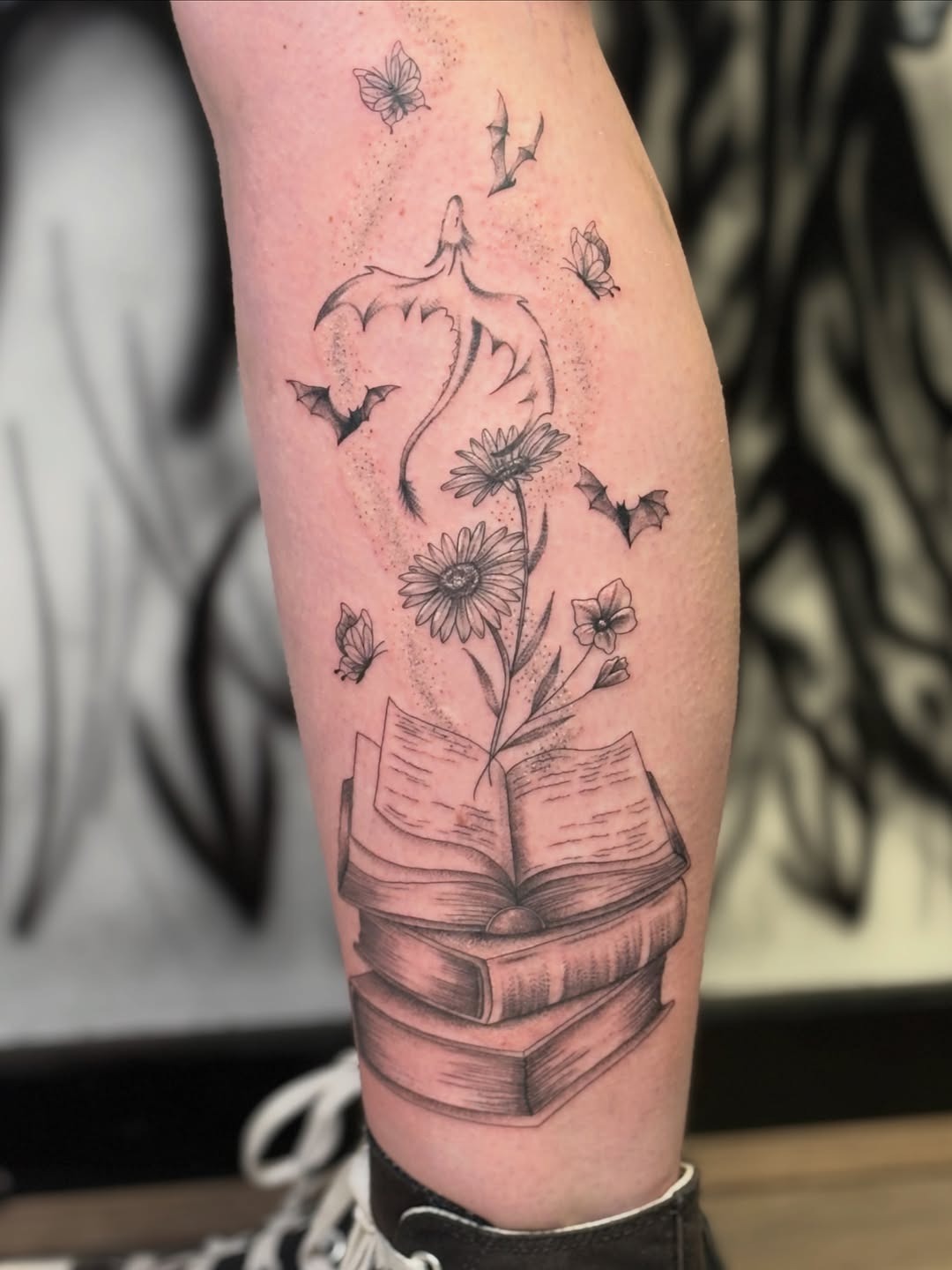 Whimsical Floral and Dragon Book Tattoo