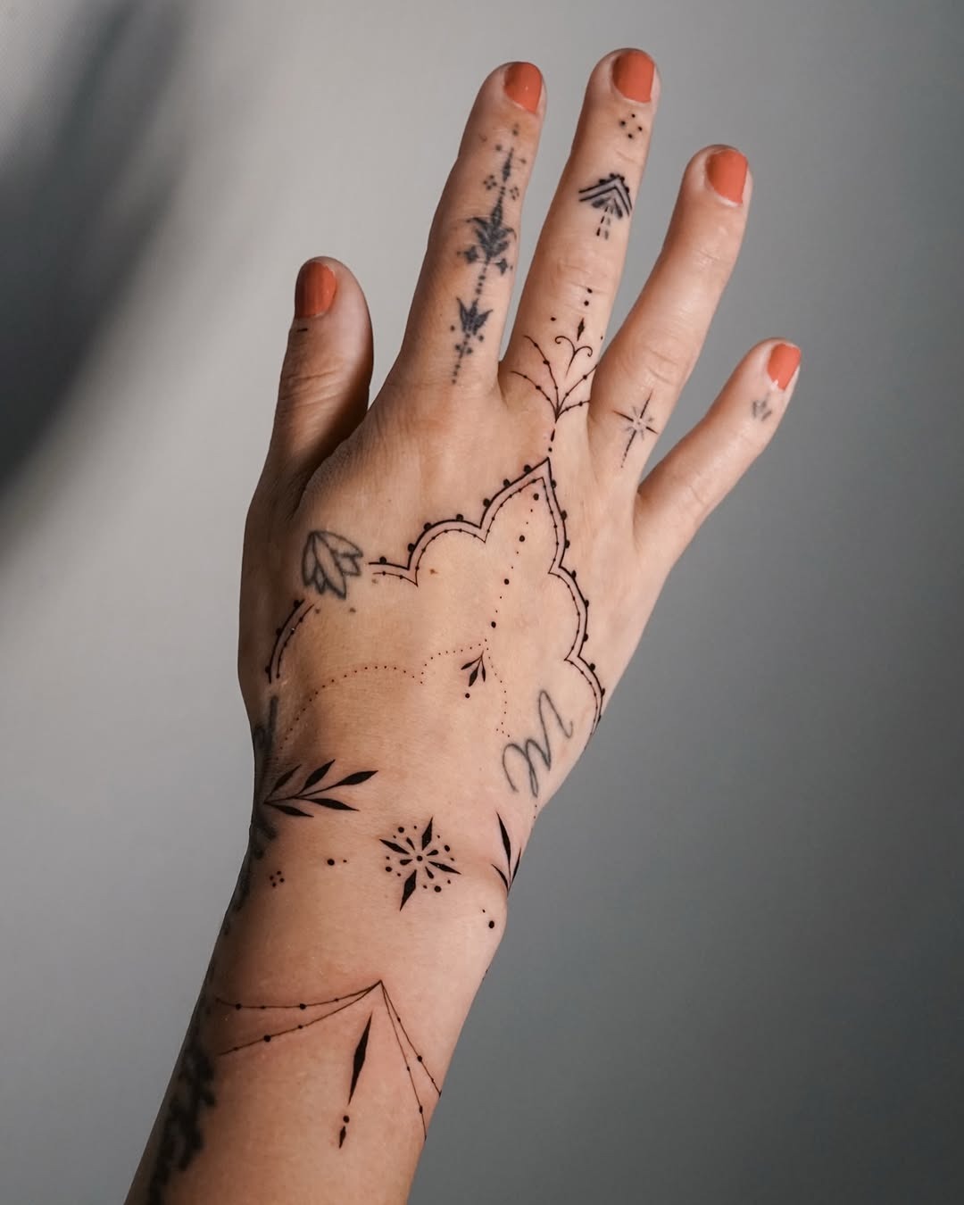 Intricate Ornamental Hand Tattoo