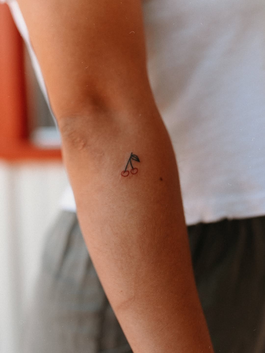 Delicate Cherry Stick and Poke Tattoo