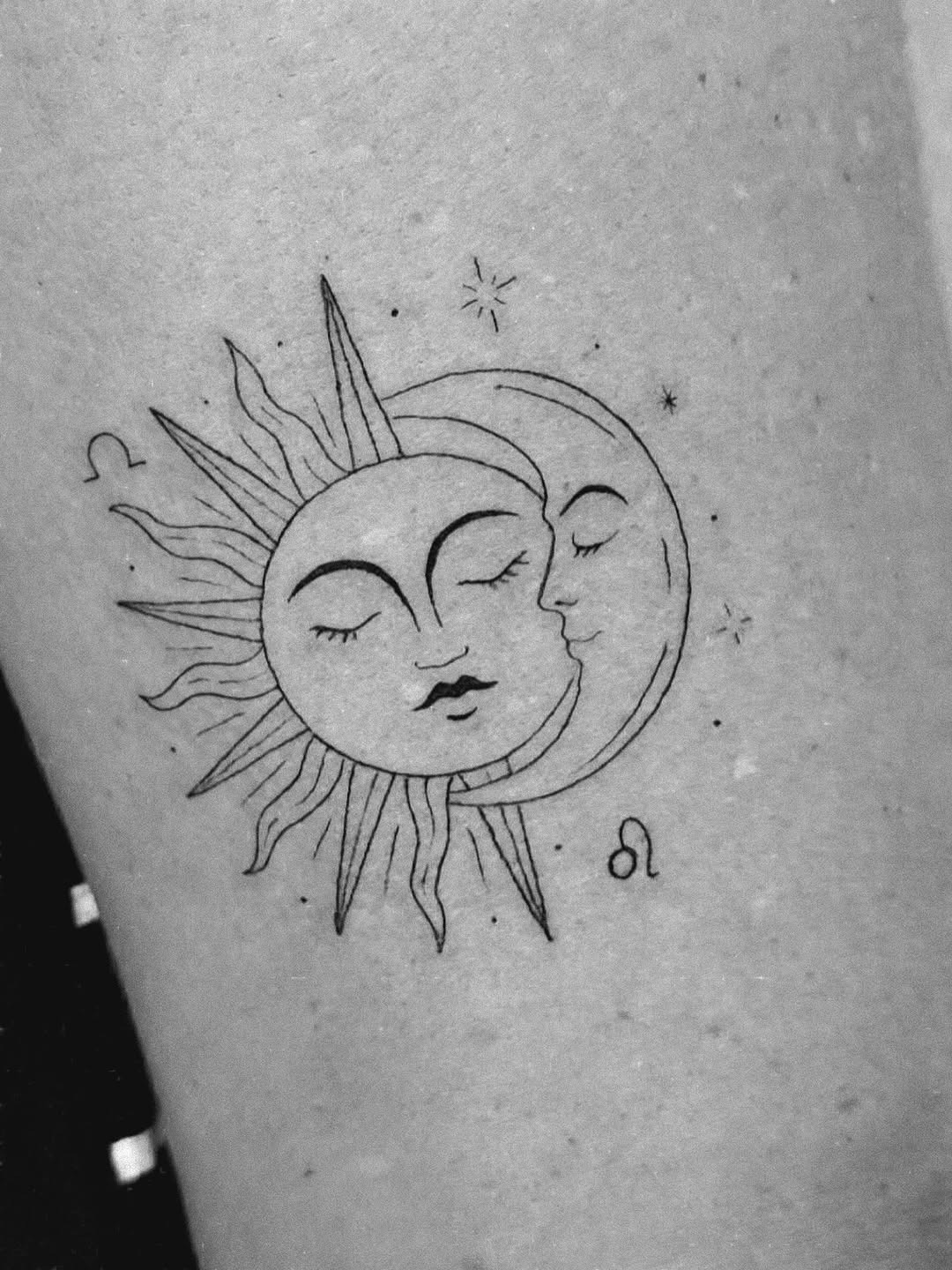 Whimsical celestial line art tattoo
