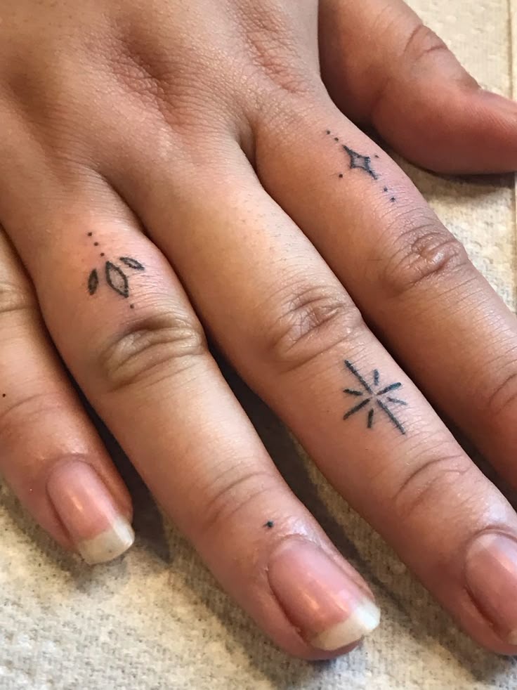 Delicate Finger Hand-Poked Tattoos