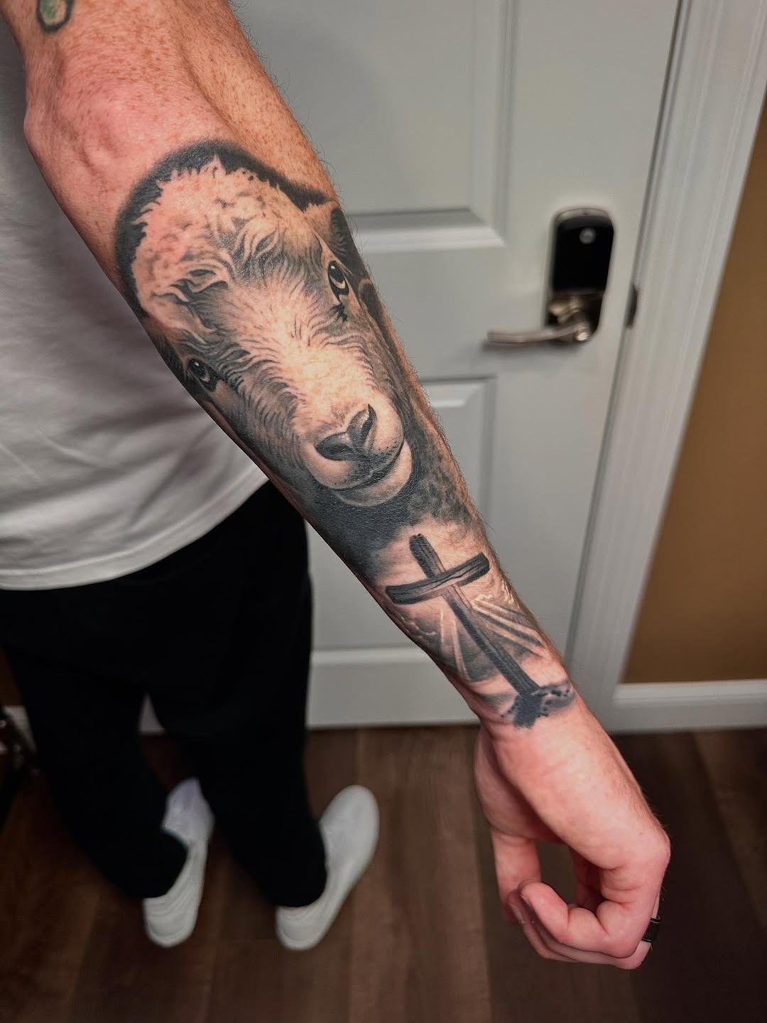 Detailed Lamb and Cross Tattoo