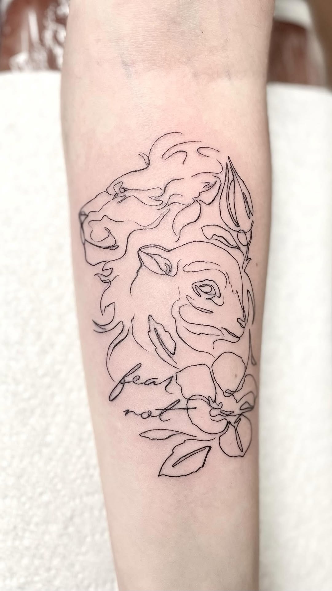 Fine Line Lamb and Lion Tattoo