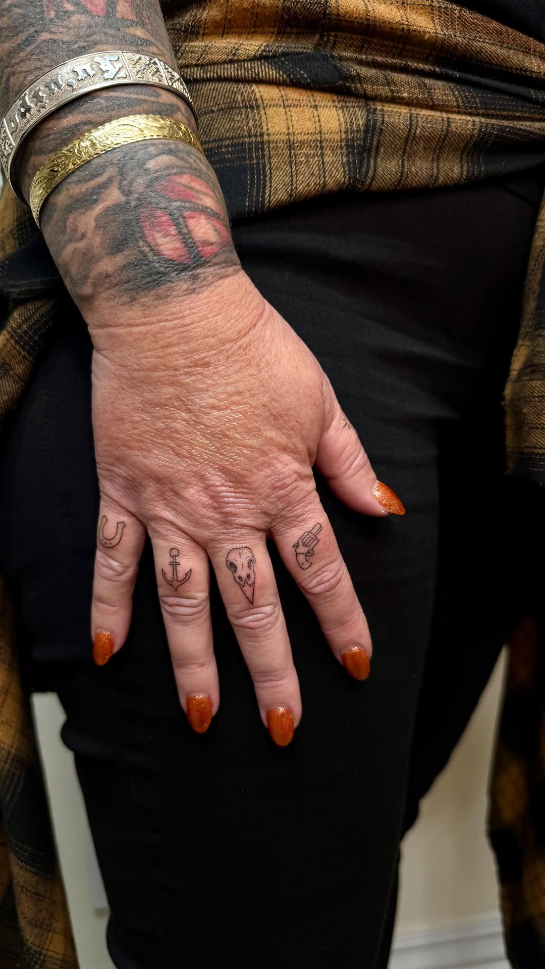 Eclectic Single-Needle Finger Tattoos