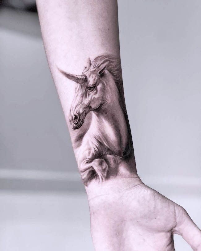 Realistic Portrait Unicorn Forearm Tattoo