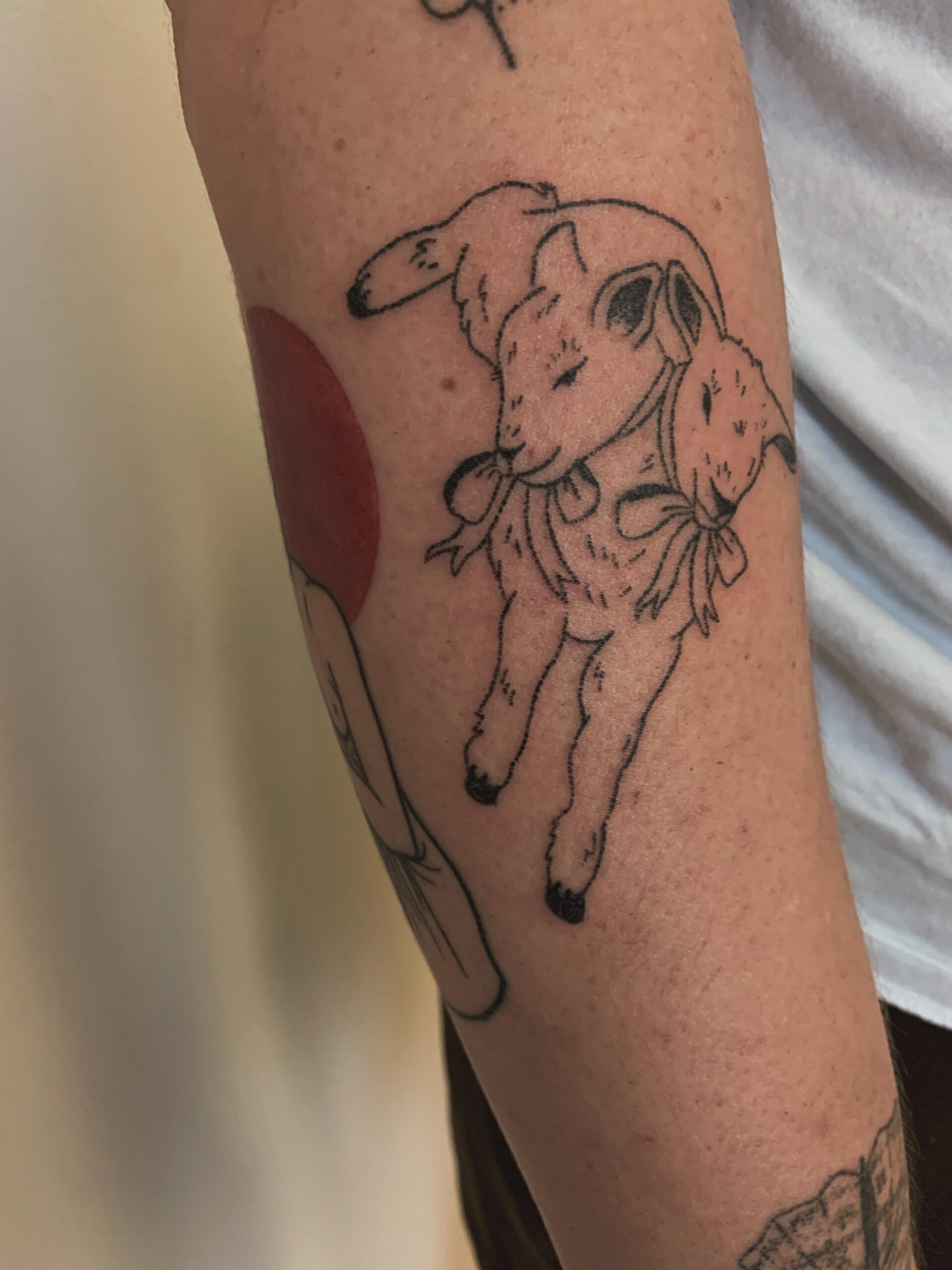 Delicate Twin Lamb Fine Line Tattoo