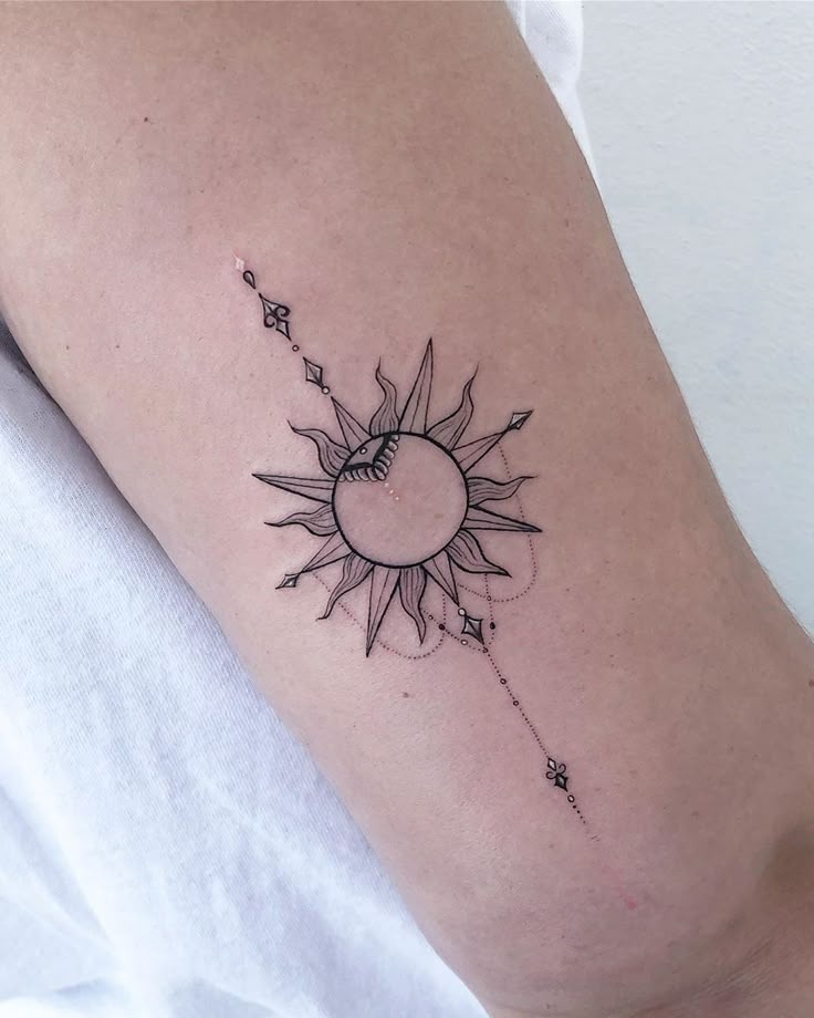 Minimalist Fine-Line Sun Tattoo Inspiration