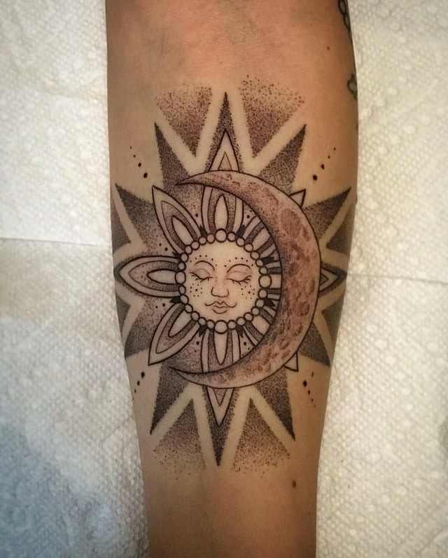 Intricate Celestial Sun and Moon Tattoo