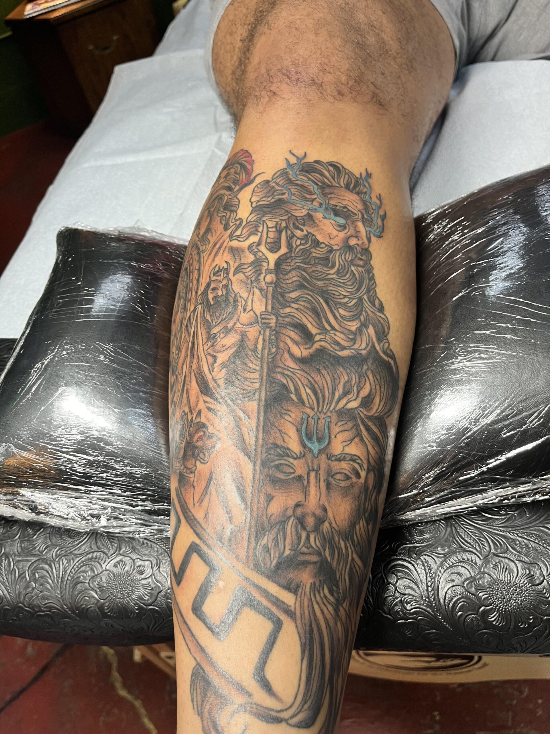 Powerful Poseidon Leg Sleeve Tattoo