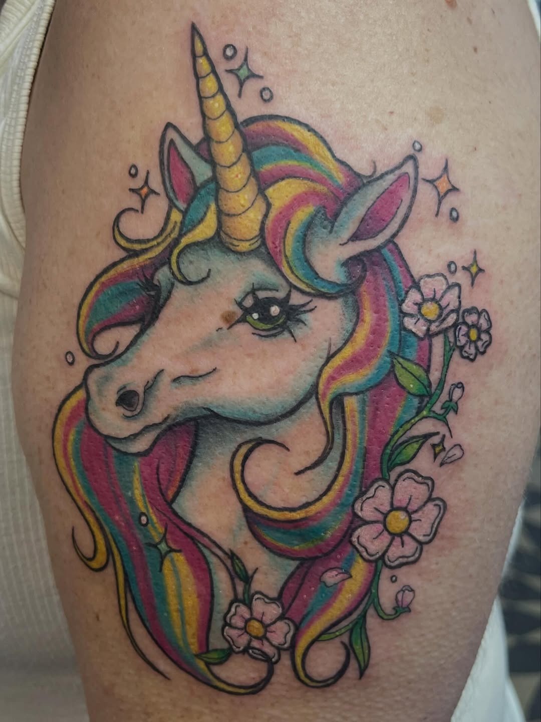 Vibrant Rainbow Mane Unicorn Tattoo