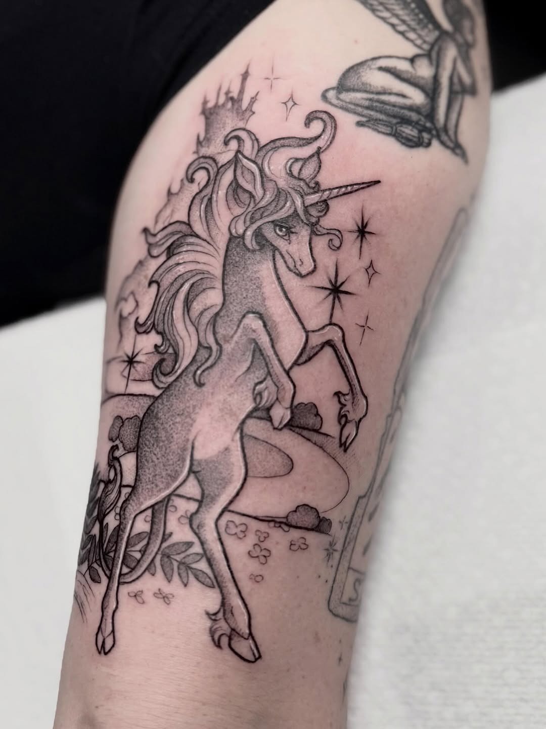 Classic Illustrative Unicorn Arm Tattoo