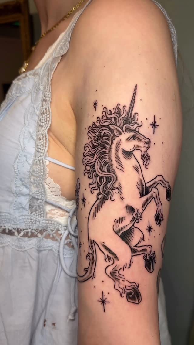 Whimsical Detailed Unicorn Tattoo