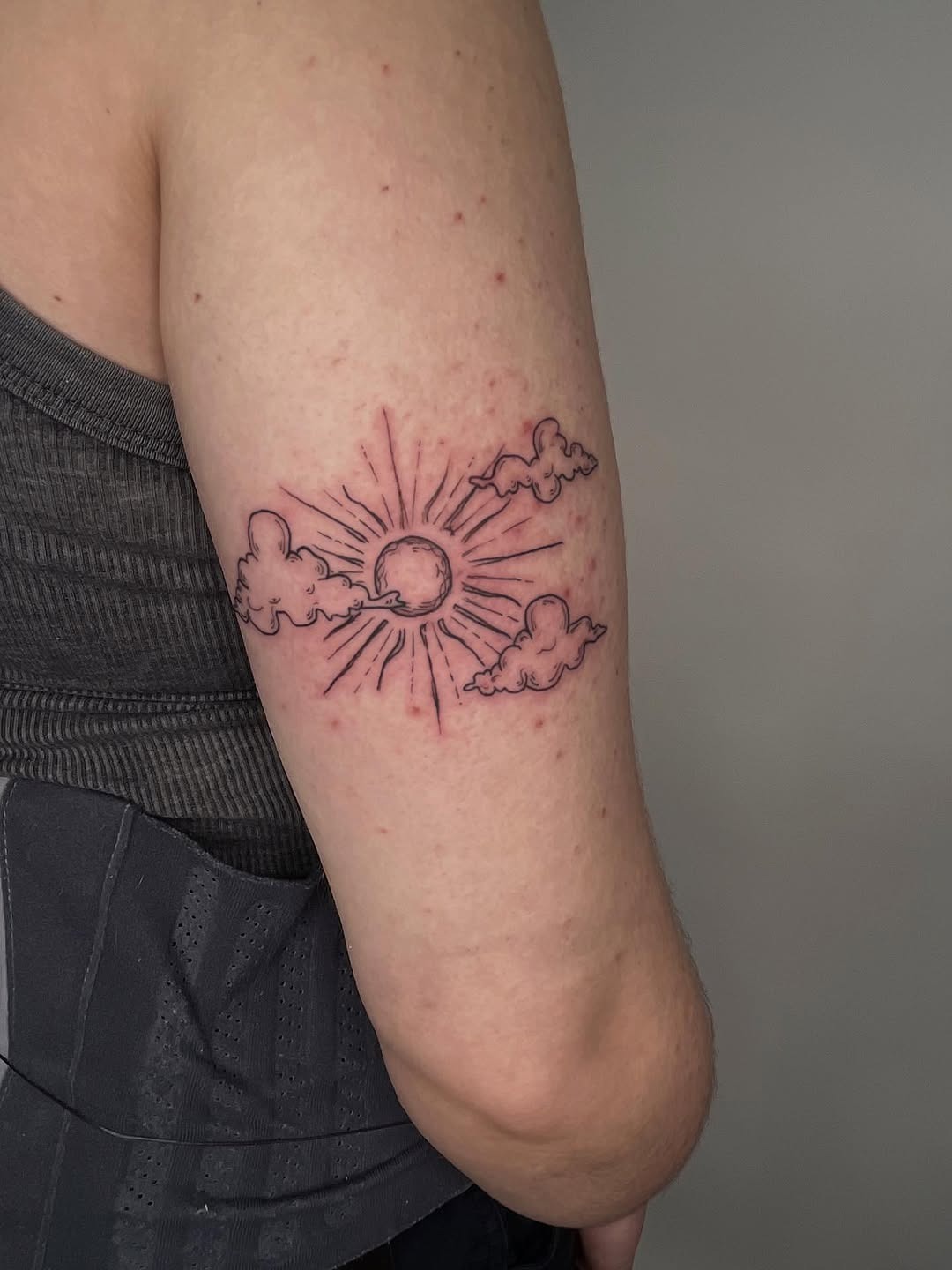 Cute sun and cloud tattoo