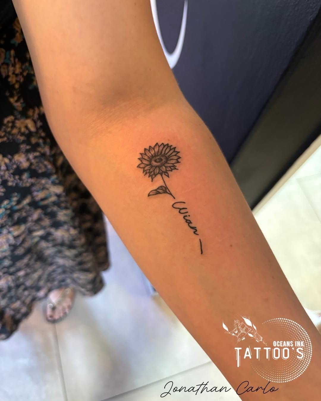 Delicate Sunflower Forearm Tattoo