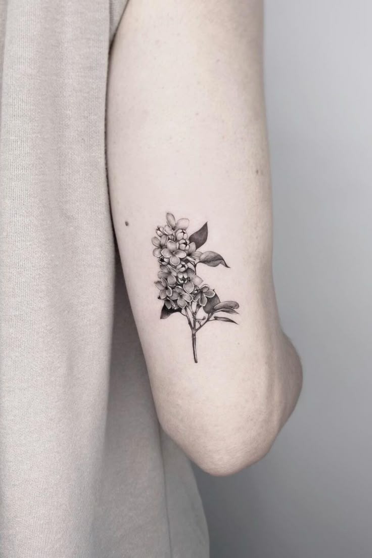 Minimalist Black and Grey Lilac Tattoo