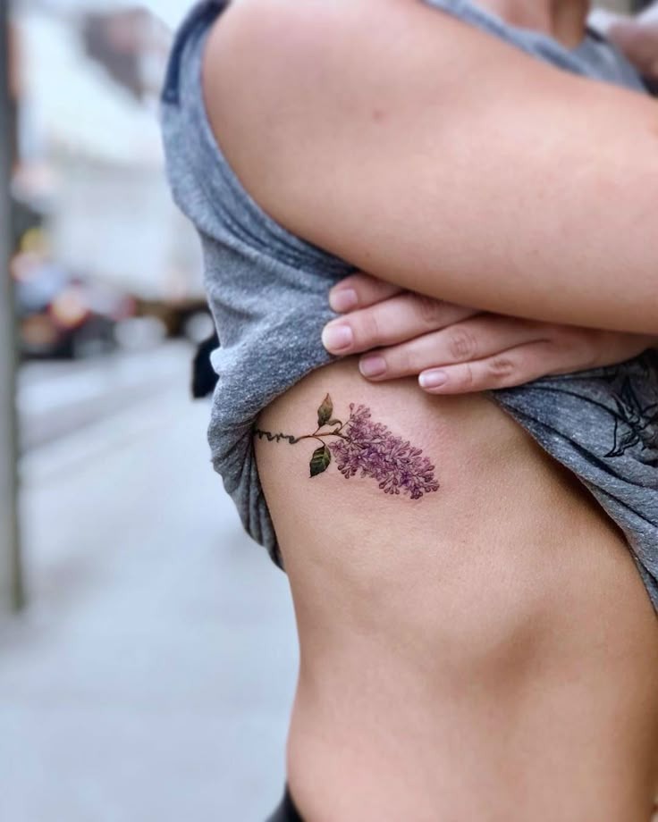 Elegant Lilac Rib Tattoo