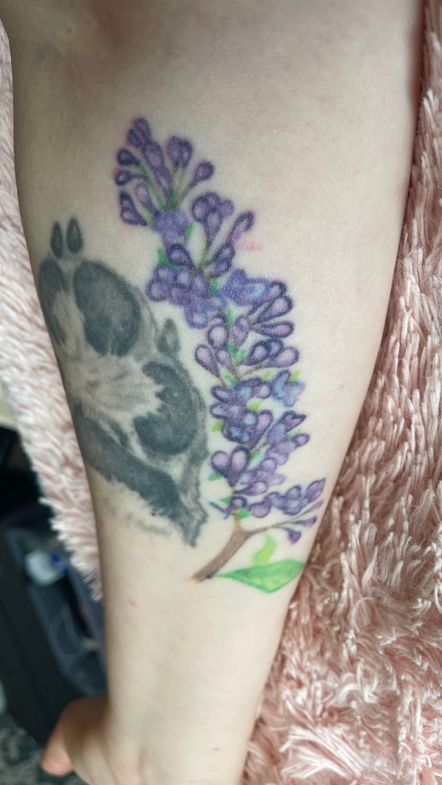 Delicate lilac floral tattoo