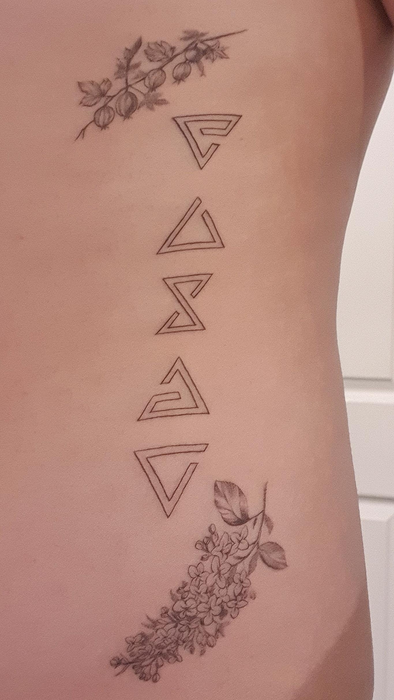 Geometric Lilac and Symbol Tattoo