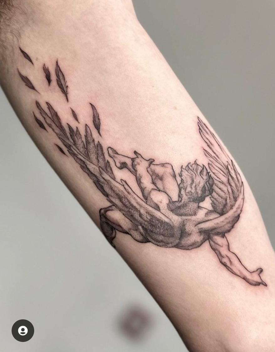 Intricate Fallen Angel Wing Tattoo