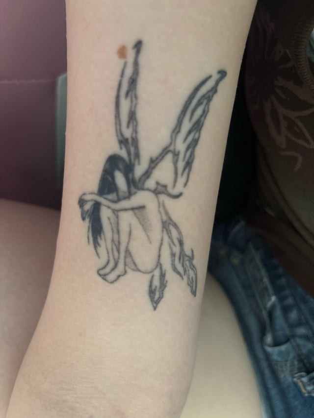Whimsical Fairy Wing Tattoo Art