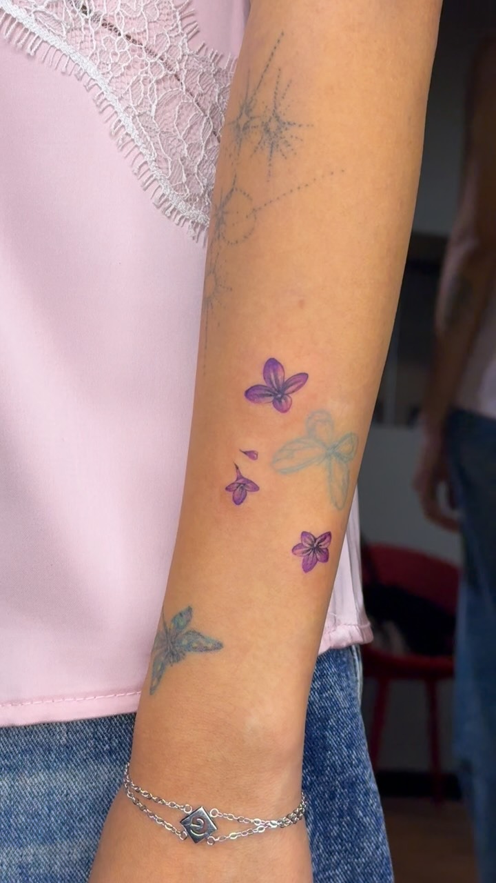Minimalist Lilac Petal Tattoo Art