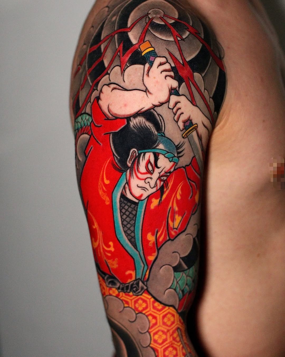 Vivid Japanese warrior shoulder piece
