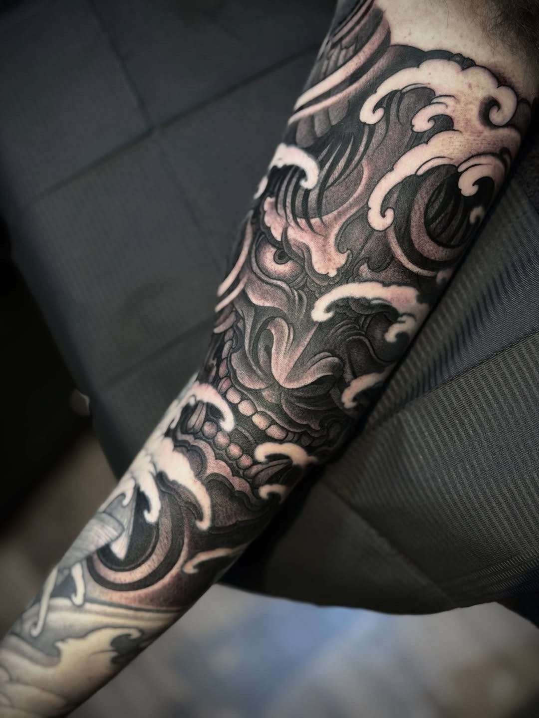 Dark and detailed Hannya sleeve tattoo