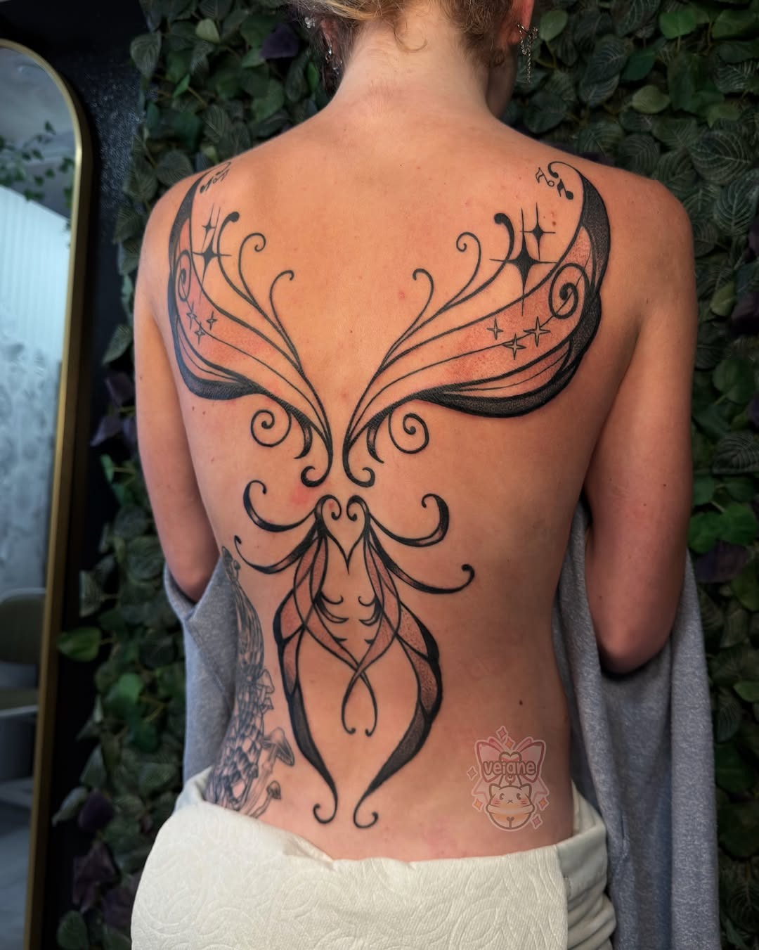 Elegant Ornamental Wing Tattoo