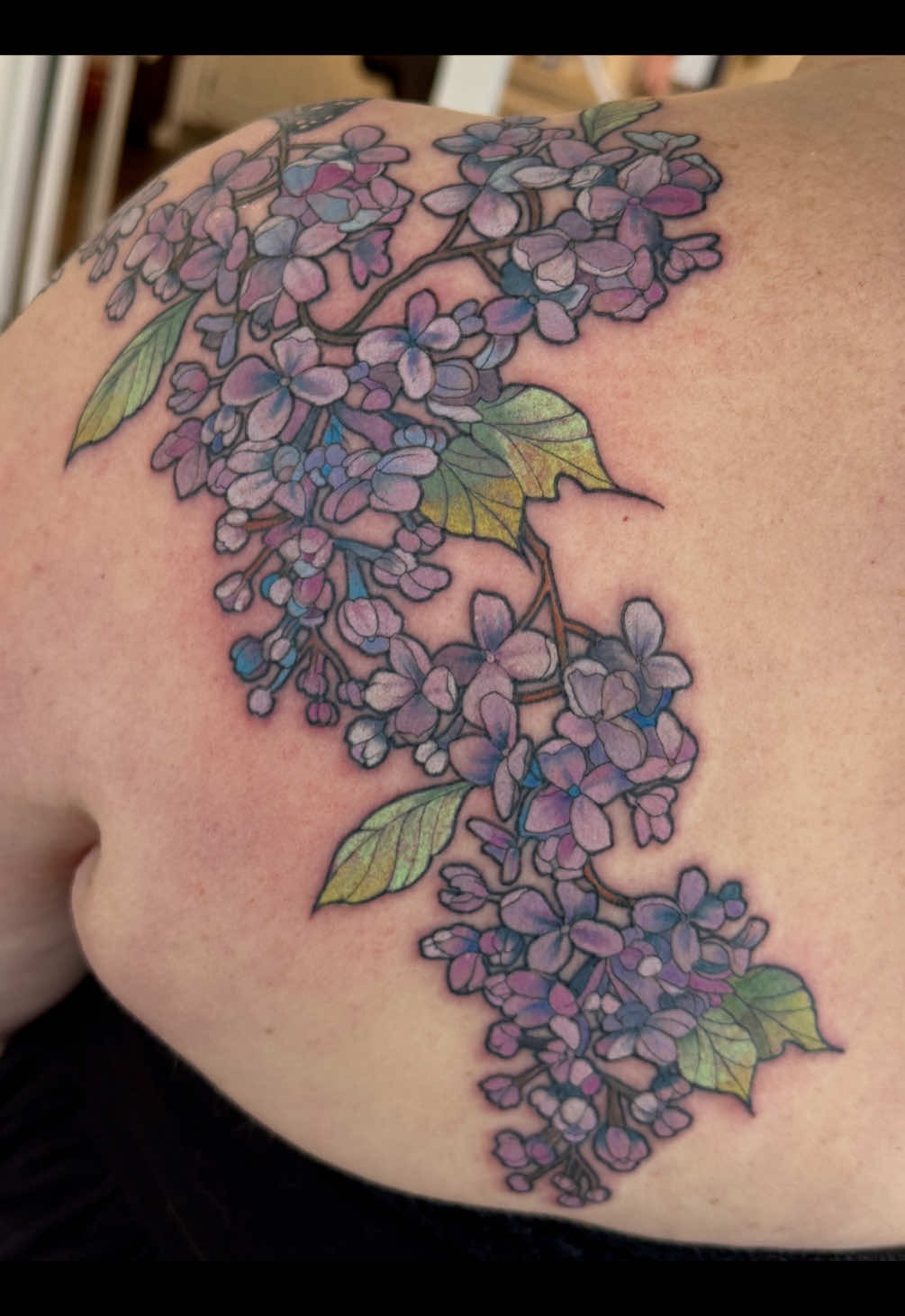 Beautiful cascading lilac shoulder piece