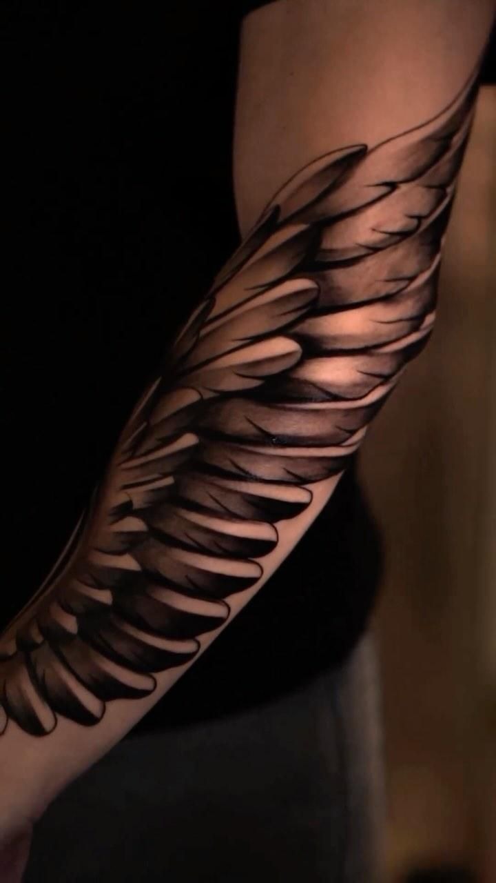 Detailed Wing Forearm Tattoo