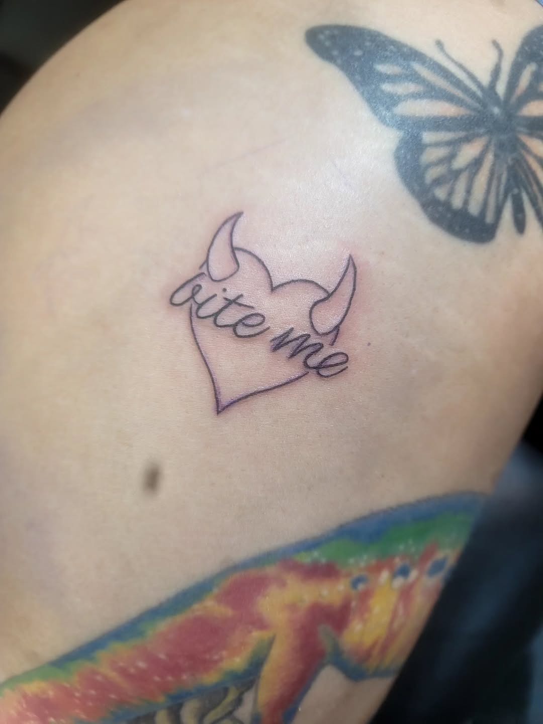 Cute 'Bite Me' devil heart tattoo