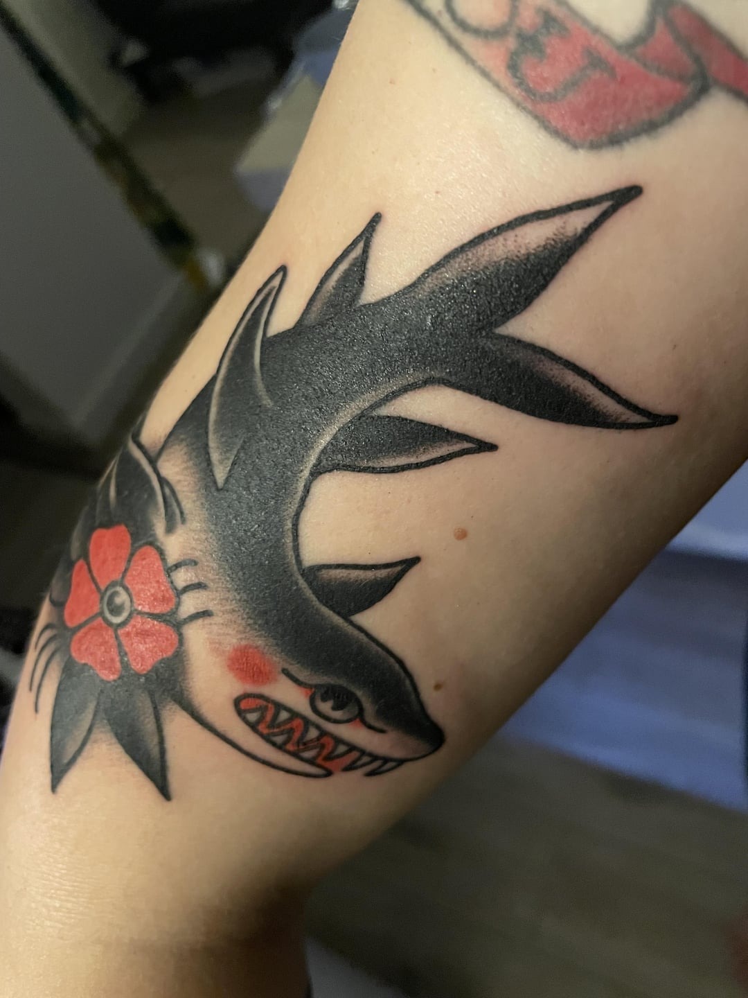 Bold traditional shark tattoo art