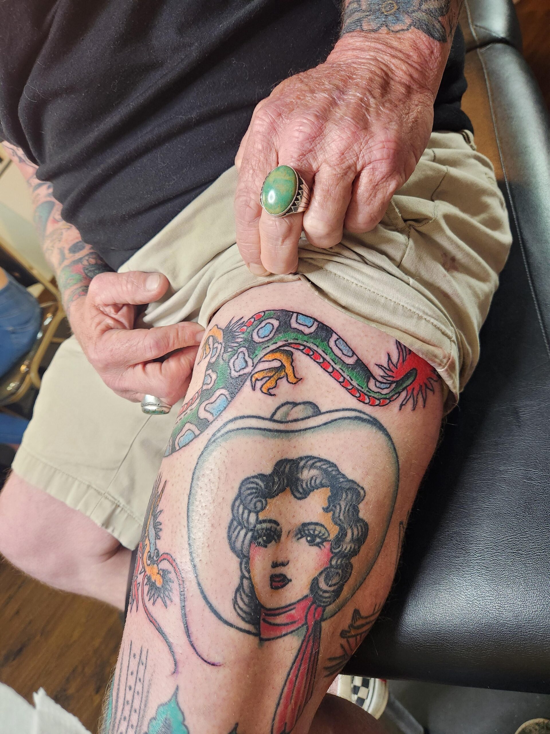 Vibrant traditional leg tattoo art