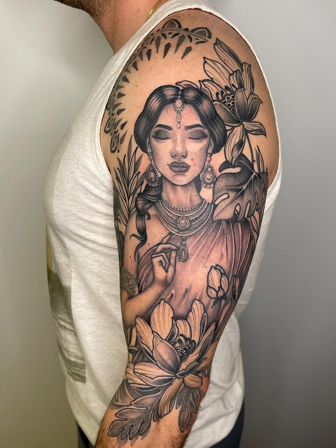 Stunning Indian-inspired traditional tattoo design