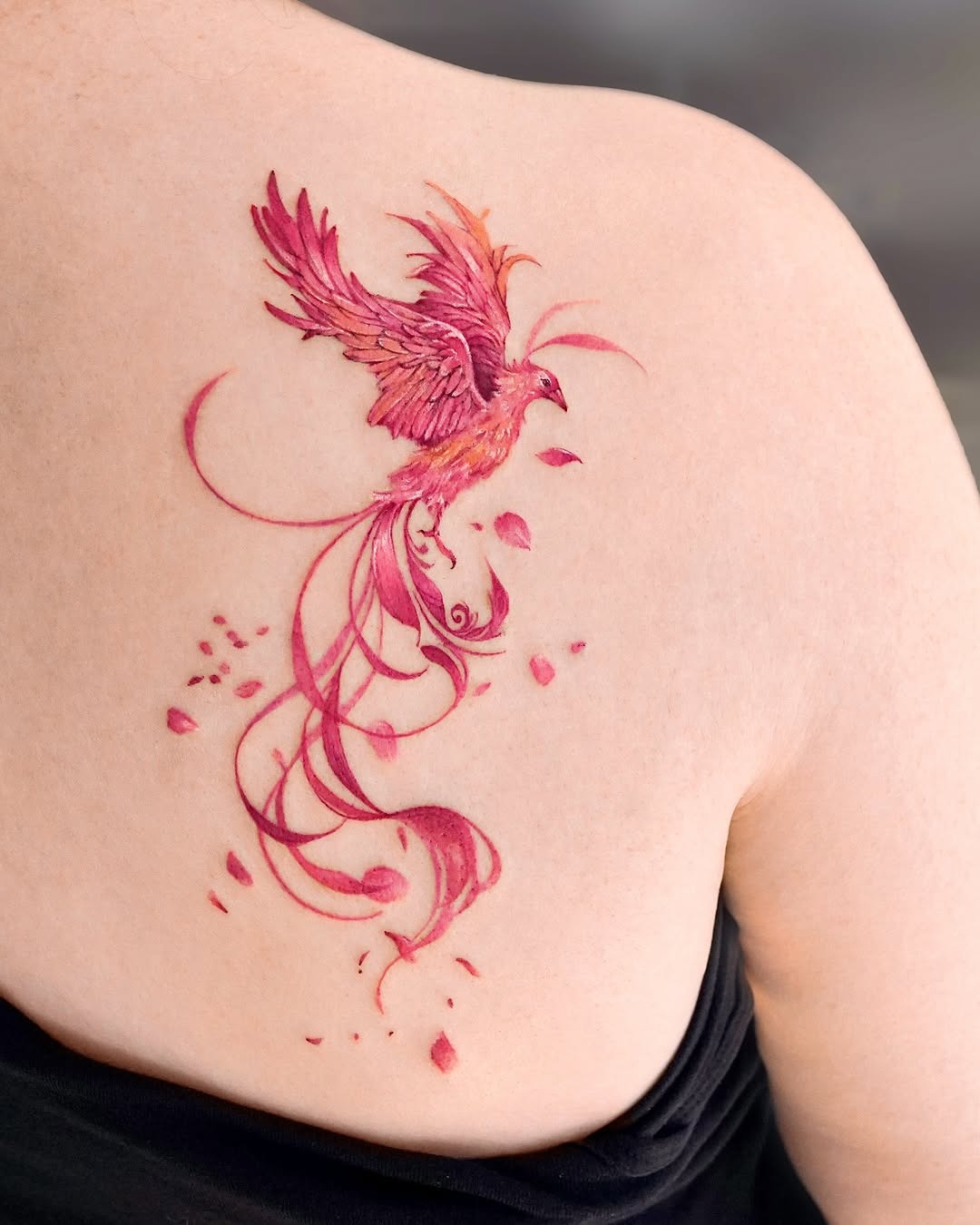 Vibrant Watercolor Phoenix Back Tattoo