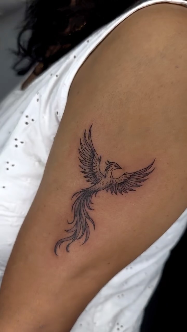 Subtle Phoenix Arm Tattoo