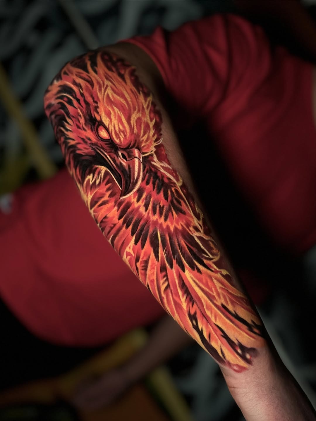 Fiery Phoenix Sleeve Tattoo