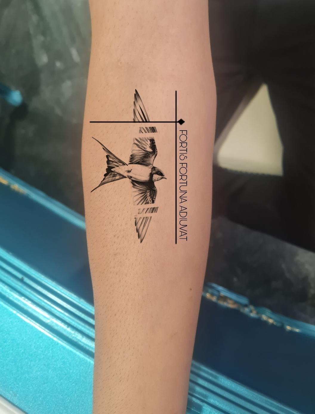 Minimalist Bird and Script Forearm Tattoo