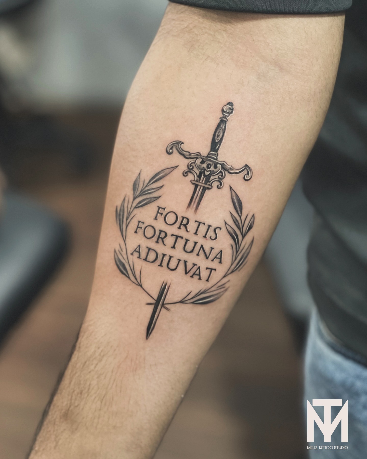 Classic Sword and Wreath Design