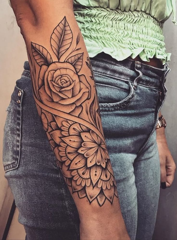 Floral mandala forearm tattoo inspiration