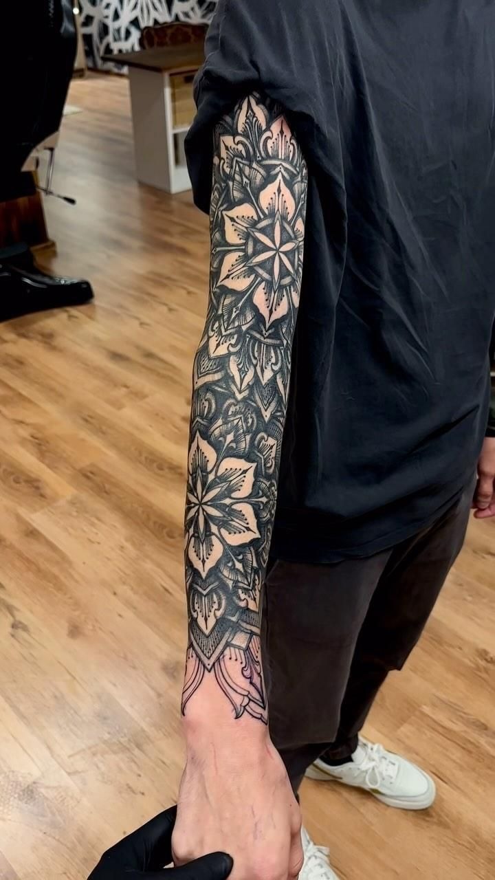 Intricate full-sleeve mandala ink