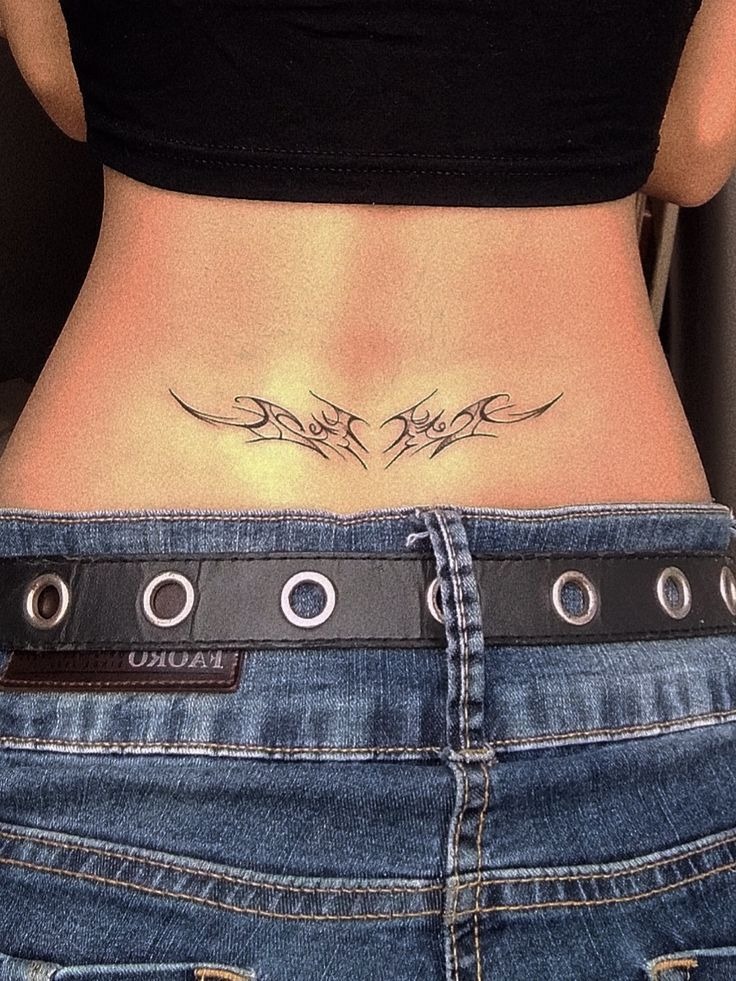Delicate Tattoos for the Lower Back