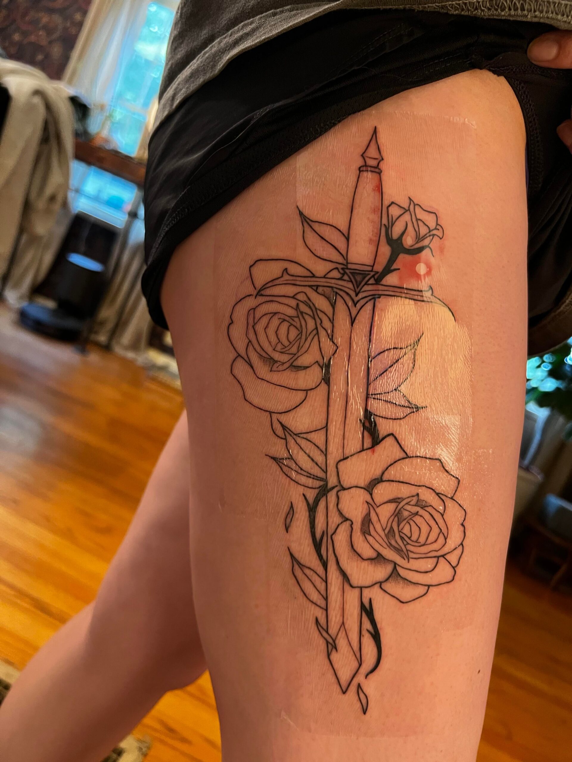 Delicate Floral and Dagger Fine Line Tattoo