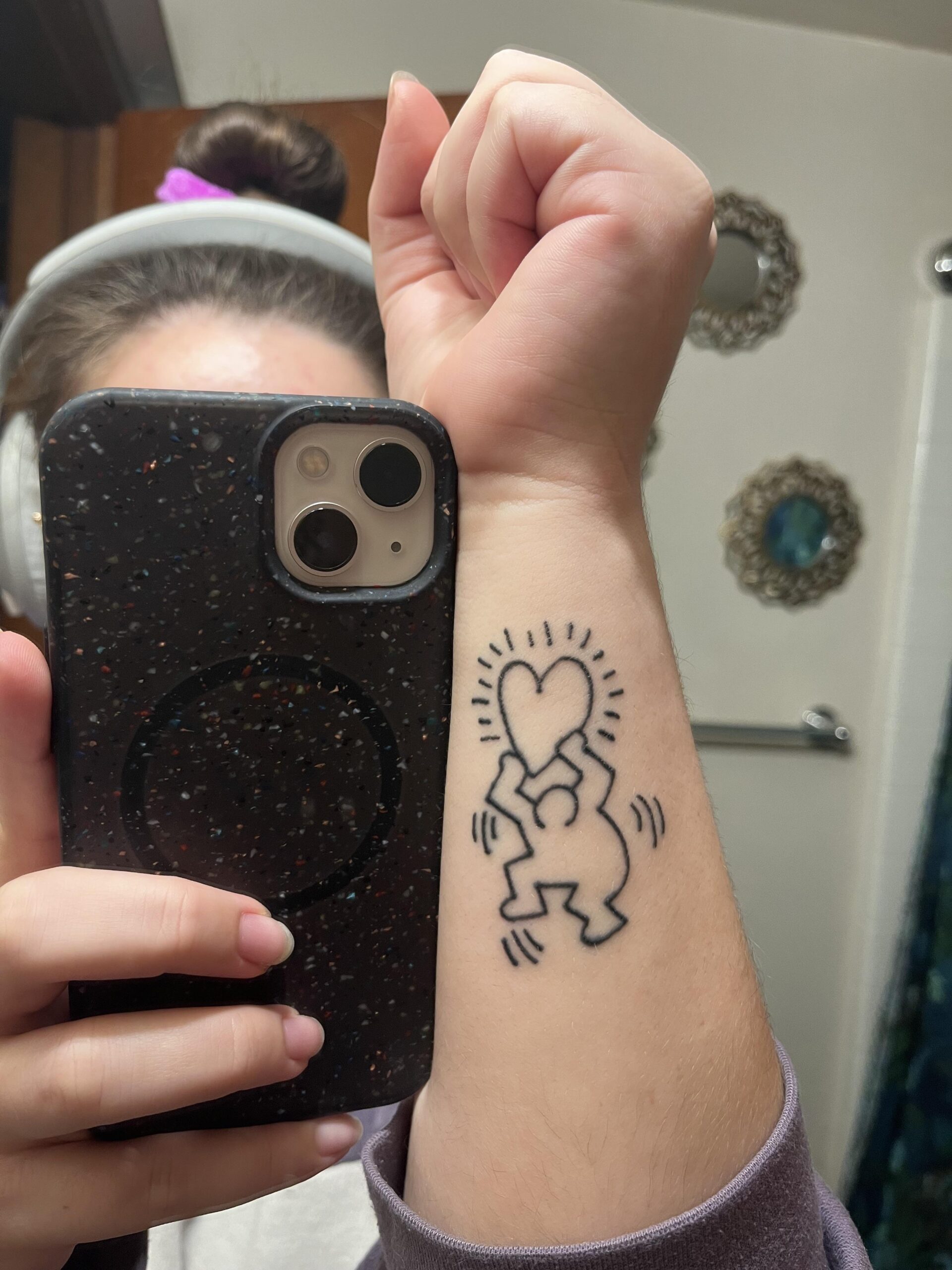 Iconic Keith Haring Inspired Arm Tattoo