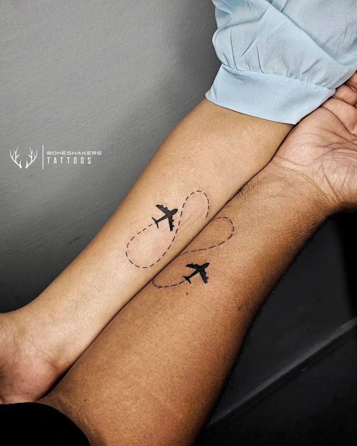 Wanderlust-Inspired Couple Tattoos