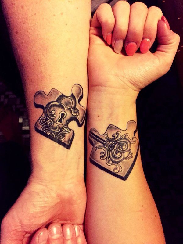 Intricate Puzzle Piece Couple Tattoos