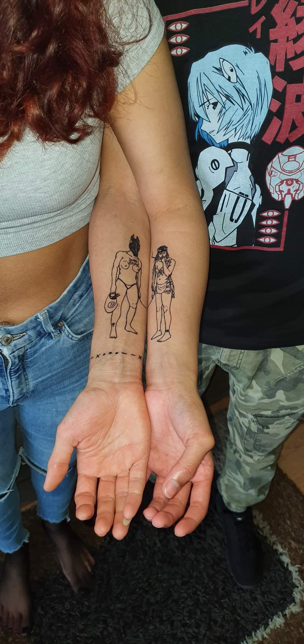 Matching Fine-Line Artistic Tattoos