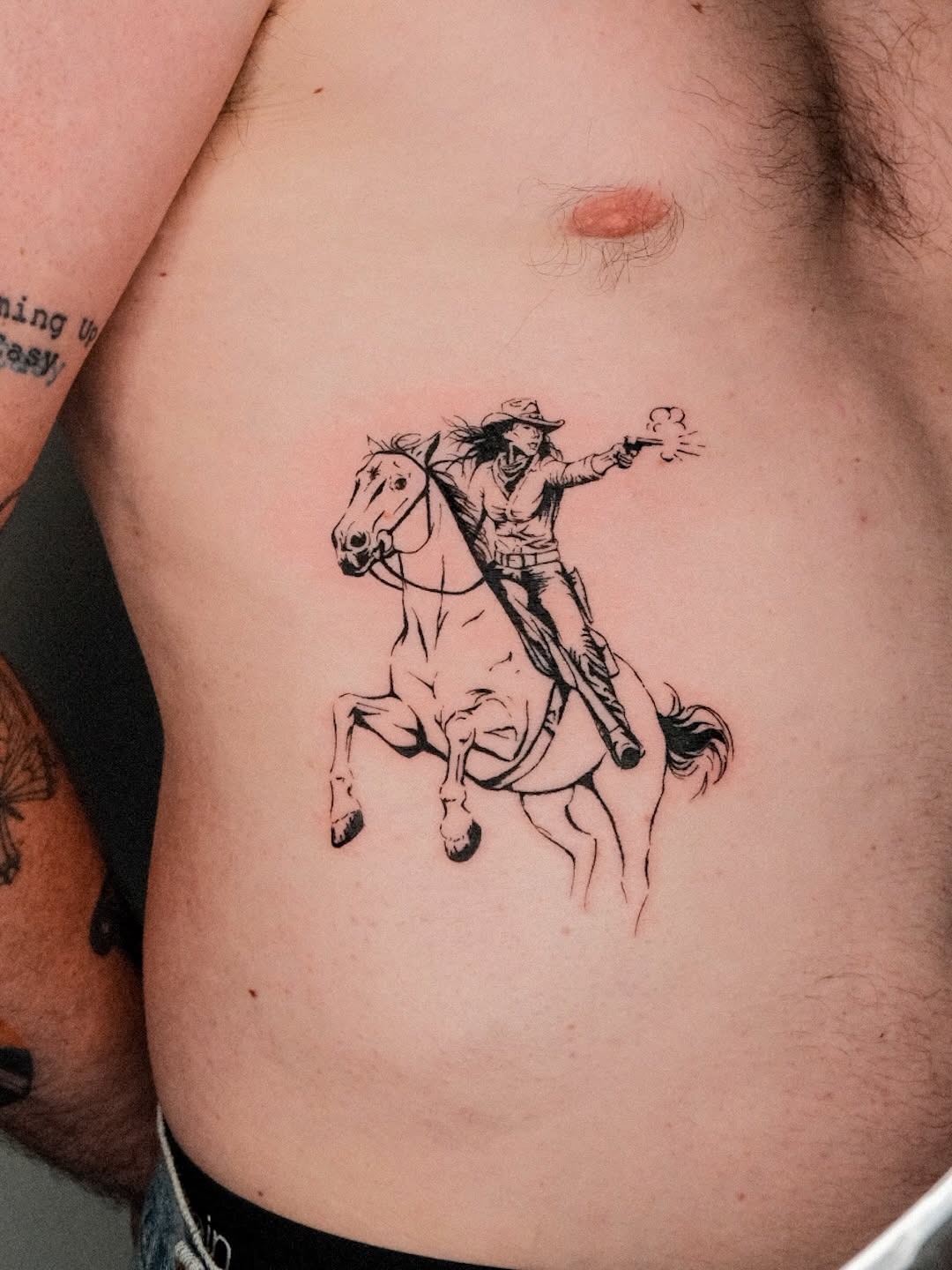 Classic Western Rider Outline Tattoo