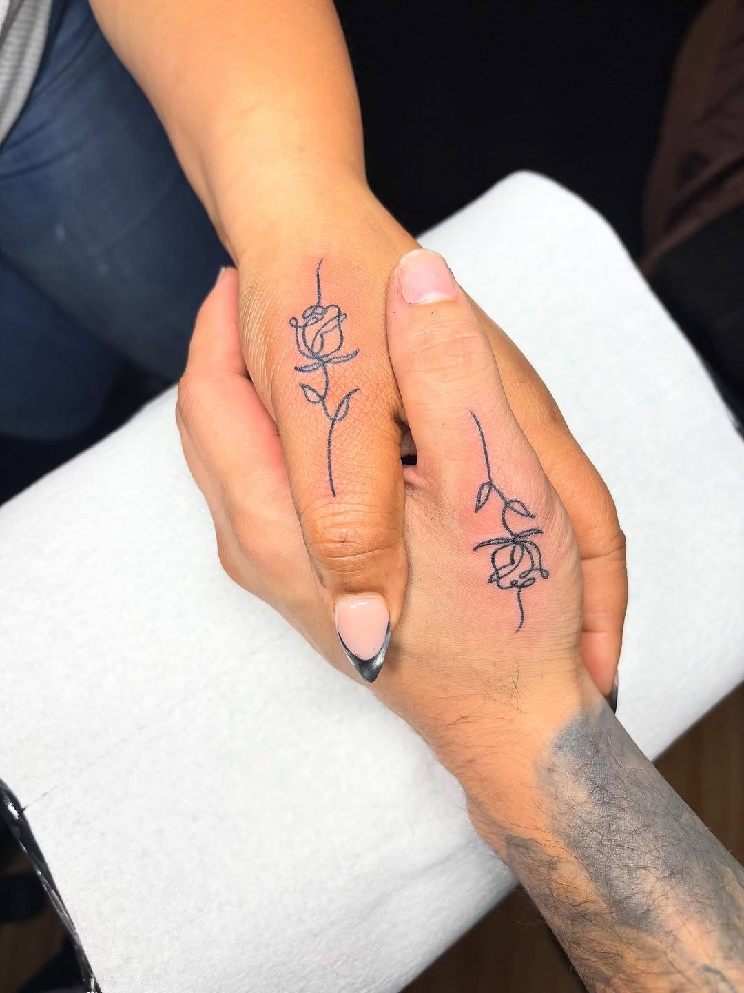 Delicate Matching Rose Finger Tattoos