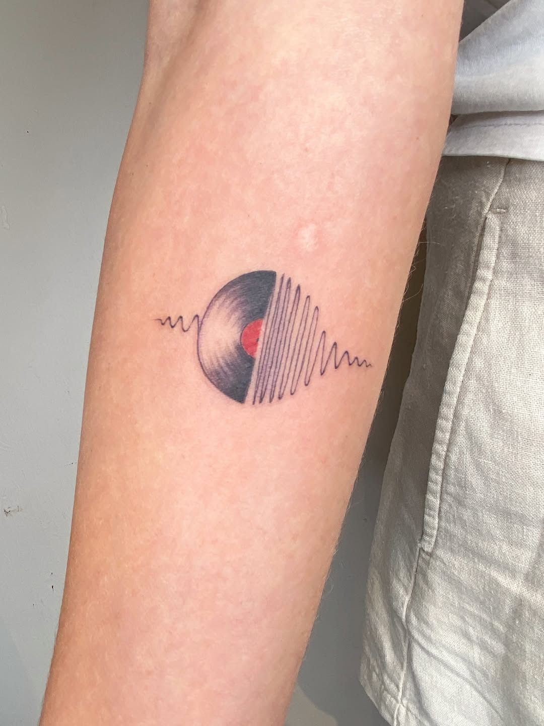 Modern Vinyl Record Soundwave Tattoo